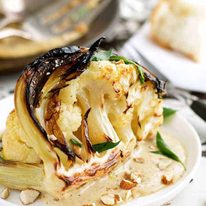 Ester's Roasted Cauliflower with Almond Sauce on white plate