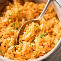 Fluffy, beautifully seasoned Mexican Red Rice (Arroz Rojo). Truly like what you get at restaurants! recipetineats.com
