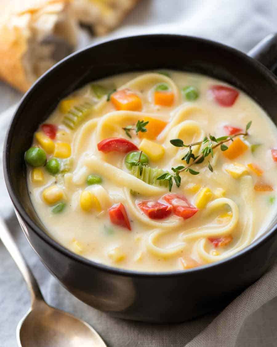 Cream of Vegetable Soup with Noodles (no cream!) in a black soup bowl, ready to be eaten
