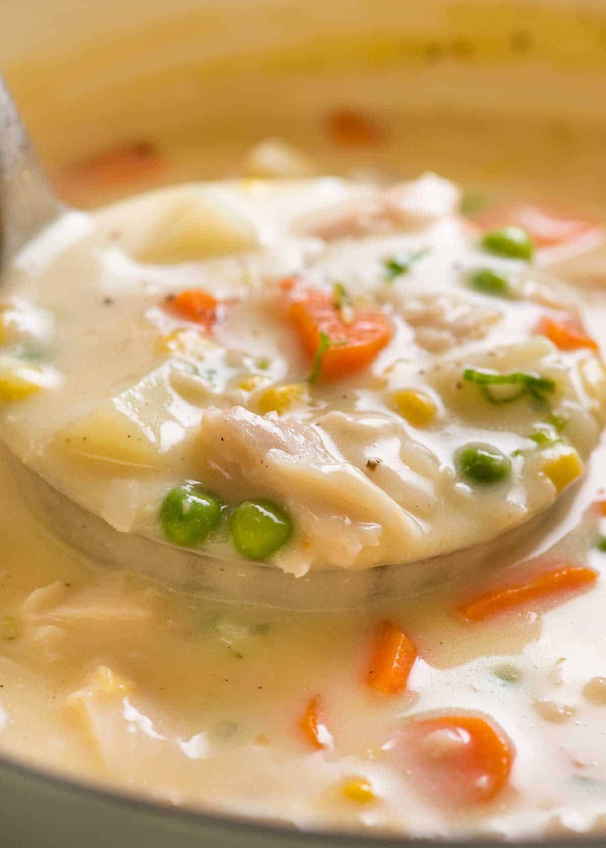 Ladling Fish Chowder Soup out of pot, fresh off the stove