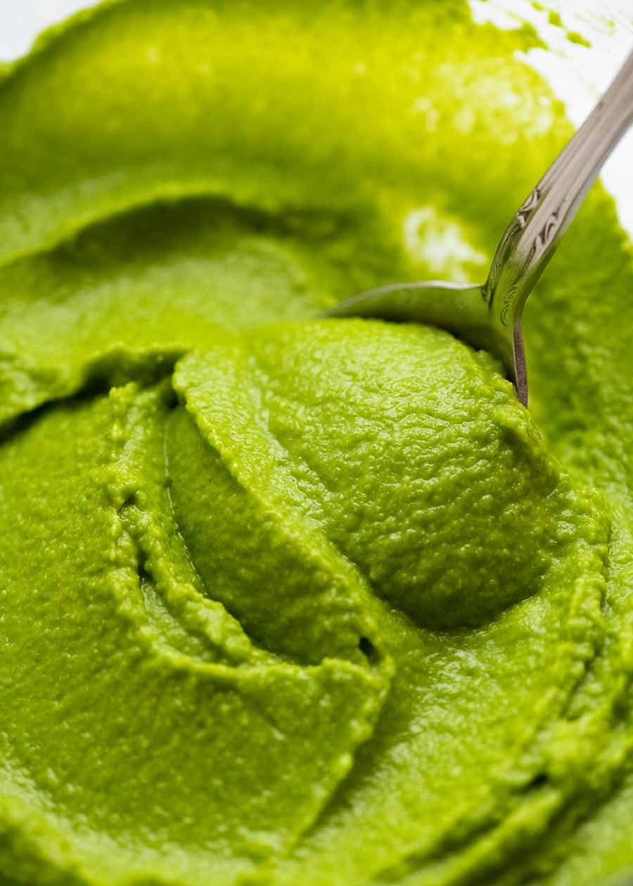 Silky smooth pea puree in a bowl, ready to be served
