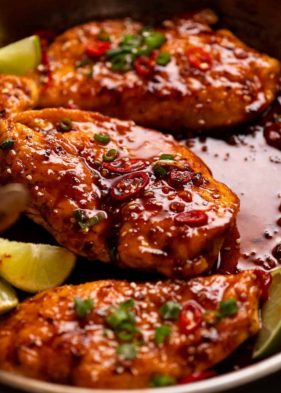 Close up of Asian Chilli Chicken in a skillet, fresh off the stove